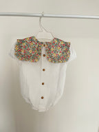 Pelele blanco con baberola verano